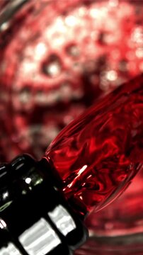 Red wine is poured into a glass. Top view. Filmed on a high-speed camera at 1000 fps. High quality FullHD footage