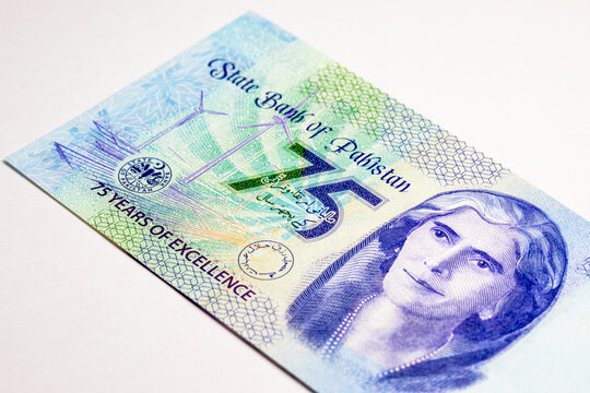 Pakistani 75 Rupees banknote Features the portrait of Fatima Jinnah, wind turbines symbolizing green energy. Money of Pakistan.