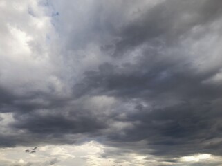 Fototapeta premium Dramatic dark storm clouds in the sky before rain background