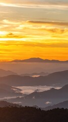 Fototapeta premium the sun is setting over the mountains