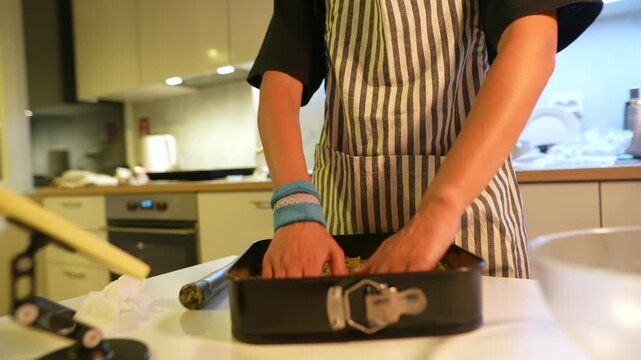 Kitchen scene capturing precise method of dessert preparation and filming