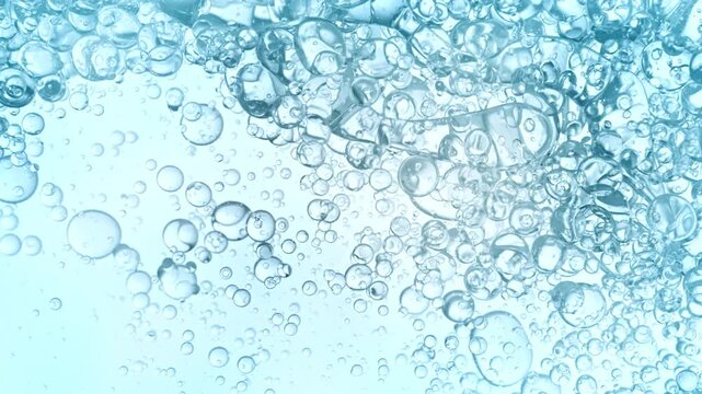Super Slow Motion Shot of Oil Bubbles Floating in Water at 1000fps.
