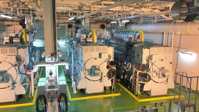 he raw, utilitarian atmosphere found in the engine room of a modern ship.