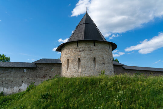 Izborsk Tower of the Holy Dormition Pskov-Pechersk Monastery on a sunny summer day, Pechory, Pskov region, Russia