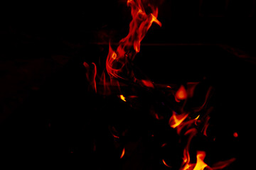 Fototapeta premium Background of the flame in the oven. Overlay layer. Tongues of fire in a fireplace.