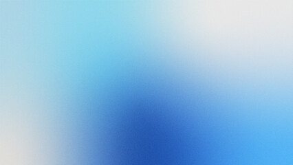 Obraz premium Colorful Grainy Gradient Background. A gradient background with blue tones.