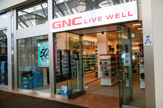 GNC Live Well supplement store entrance inside Leesburg Virginia shopping mall commercial interior