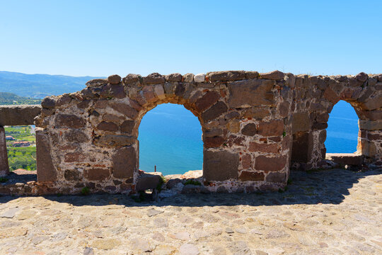 Ancient Stone Castle Wall With Arches Overlooking Blue Sea View in Molyvos