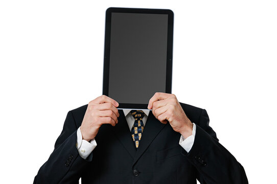 Anonymous businessman holding a tablet computer in front of his face