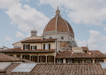 Fototapeta premium Florence Cathedral Rising Above Tuscan Rooftops