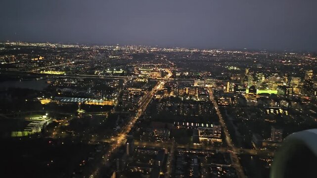 Approaching Schiphol Airport. View of Amsterdam in the late evening. Flight Krakow to Amsterdam. 
