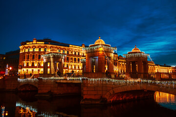 Fototapeta premium View of the Lomonosov Bridge at night. Festive illuminations.