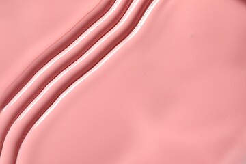 Obraz premium Pink nail polish as background, top view