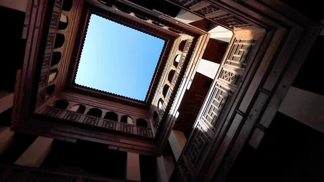 Bottom up view of the yard in traditional fundouk or karavan sarai in Fes old town Medina in Morocco