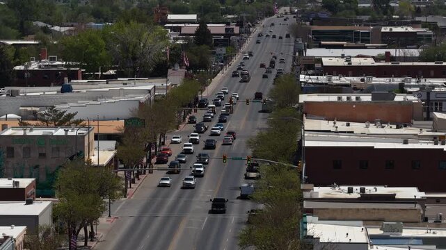 Zoom aerial shot of intersection in Vernal Utah small town in spring time