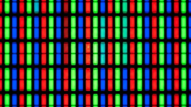OLED Display Technology: Extreme Macro View of RGB Subpixel Array Showing Individual Red Green Blue Light-Emitting Rectangles Against Black, Display Technology Micro-Electronics