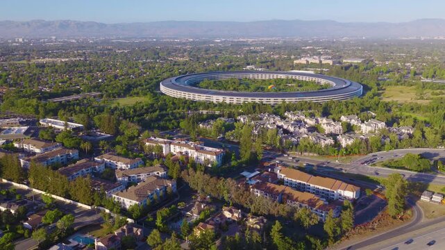 Cupertino California Aerial Pullback View of Homes and Circular Tech Campus 02