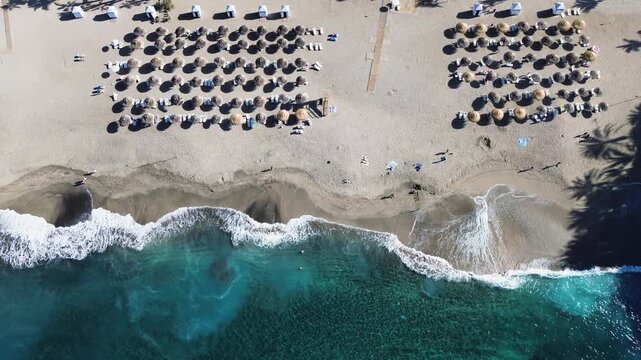 aerial view of Playa del Duque beach, San Andres village and mountains of Tenerife.