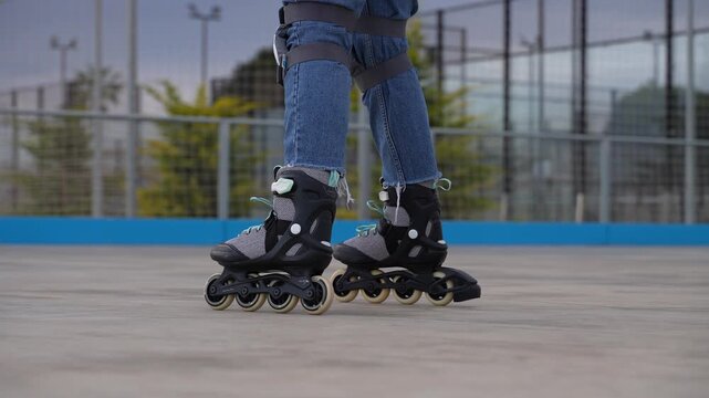 Close Up of Person Rollerblading on Outdoor Skating Rink