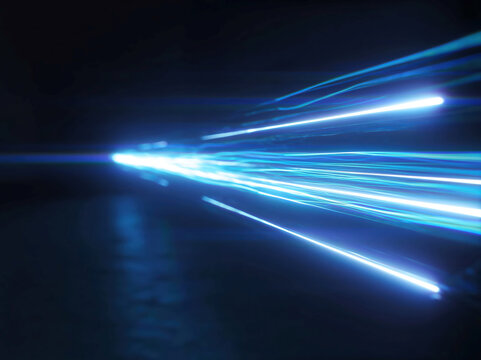 Futuristic, electric blue neon accents on a dark background, high contrast, minimal composition, dynamic scene of shooting star-like light trails radiating outward from bottom right cor - AI-Generated