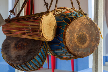 Naklejka premium A picture of the Tumdak and Tamak, two traditional and major musical instruments of the Santal community of the Indian subcontinent. Bankura, West Bengal, India