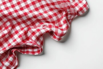 Obraz premium Flat lay of a checkered napkin on a bright white surface, ready for text placement
