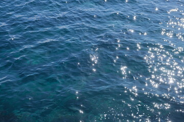 Obraz premium Sunlight Sparkling on Ocean Water