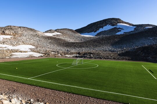 Football pitch with artificial turf, Ittoqqortoormiit, Scoresbysund, East Greenland, Greenland