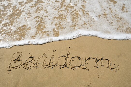 "Benidorm" written in the sand, Benidorm, Costa Blanca, Spain, Europe