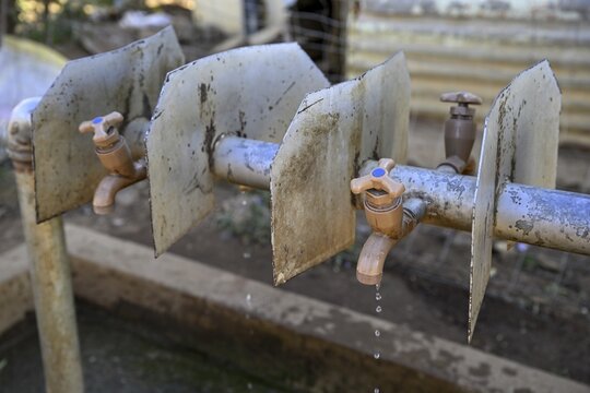 Dripping taps in the former Soweto township, water shortage, Johannesburg, Gauteng province, South Africa