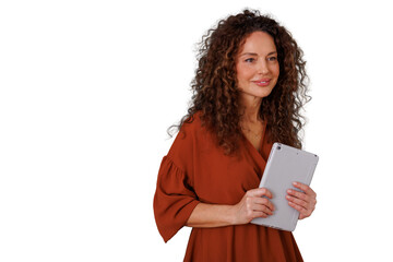 Fototapeta premium Professional woman holding tablet, looking away and smiling, displaying modern technology and communication