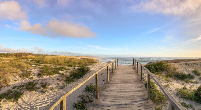 Wooden Boardwalk Leading to the Atlantic Coast at Furadouro Beach in Ovar Portugal