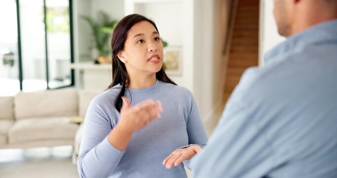 Frustrated, couple and fight with stress in home for conflict or living room dispute. Upset, woman and disagreement with man, argument or mistake for communication, cheating affair or confession