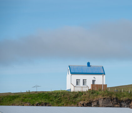building on island of Grimsey in Iceland on a sunny summer day