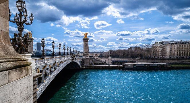 Dramatic cloudscape over the Seine River and Pont d&rsquo;I&eacute;na Bridge in Paris, France