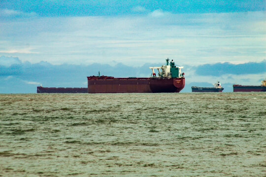 Cargo ships anchored on the horizon of S&atilde;o Marcos Bay, in S&atilde;o Lu&iacute;s, Maranh&atilde;o, Northeast Brazil.
