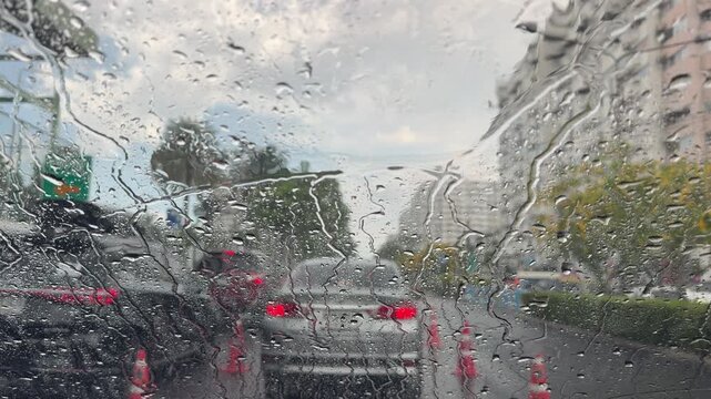 raining, droplet of water on Car mirror at Evening