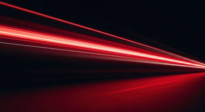 Abstract Red Light Trails Streaking Across Dark Background.
