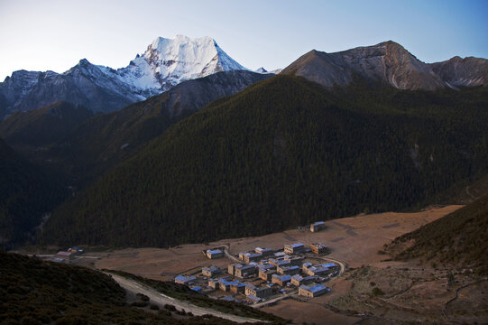 Aerial View of Mountain Village with Snow Peak in Yading