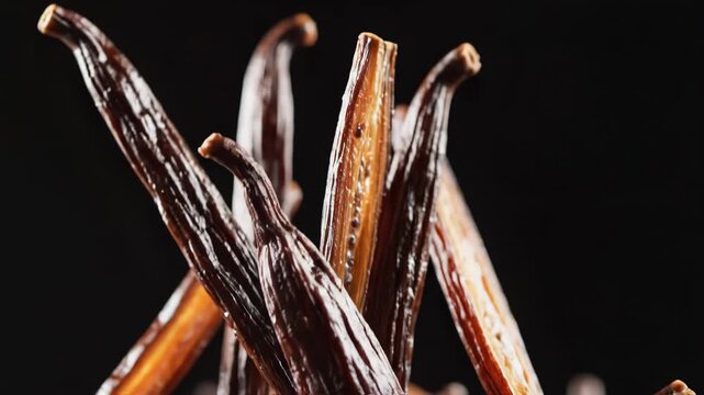 Close-Up of Vanilla Beans Against a Dark Background