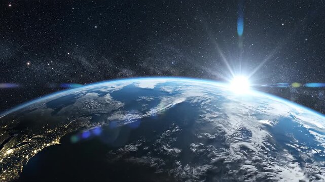Sunrise over planet Earth from space, with starry background and light flares