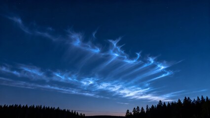 Obraz premium Panoramic View of Luminous Noctilucent Cloud Silver Webs Glowing High in a Deep Twilight Summer Sky 