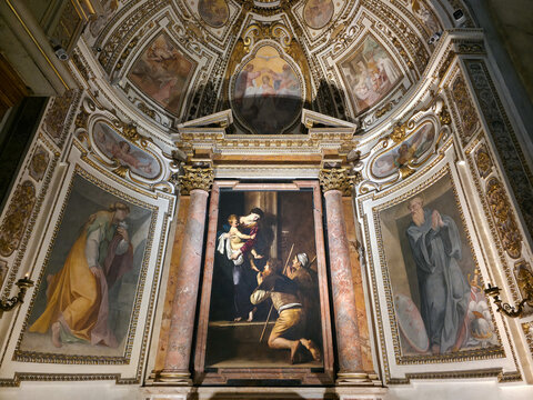 Madonna of Loreto masterpiece painting by Caravaggio in Cavalletti chapel inside Sant Agostino church, Rome