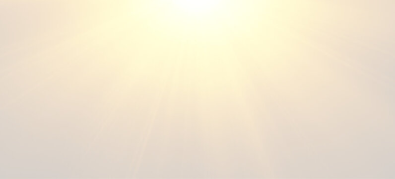 Bright golden sunbeams through thick fog, abstract warm natural sun rays effect on gentle morning mist sky background