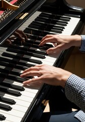 Fototapeta premium Close-up of Male Hands Playing a Classic Black Grand Piano with Natural Sunlight and Shadows