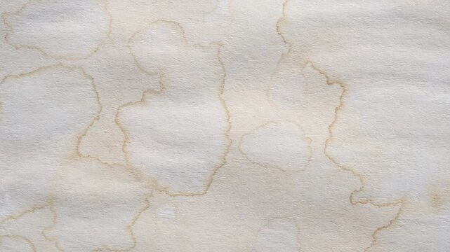 Old vintage paper texture background with aged stains and antique yellowed parchment effect stop motion