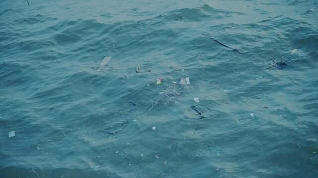 Plastic waste and household garbage floating on the sea surface, ocean pollution concept.,The world's most polluted beach, Plastic marine debris.
