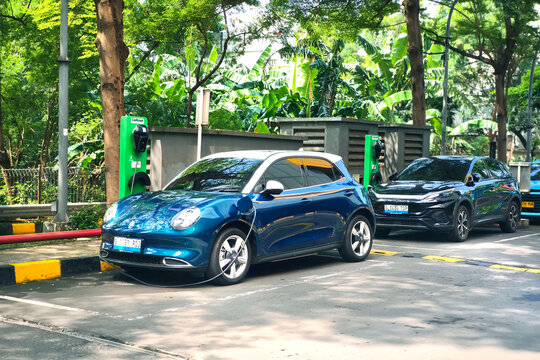 Two electric car recharged at EV charging station in jakarta