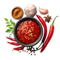 Bowl of spicy tomato soup with fresh ingredients and spices on white background © MdOmar