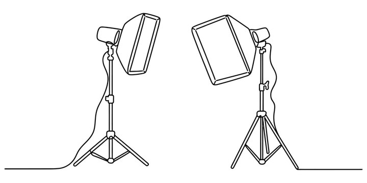 Continuous single line drawing of two studio lights with softbox equipment on tripod stands for photography and video production setup in the studio